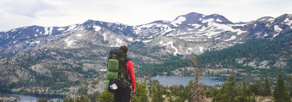 A backpacker hiking in Lake Tahoe, CA