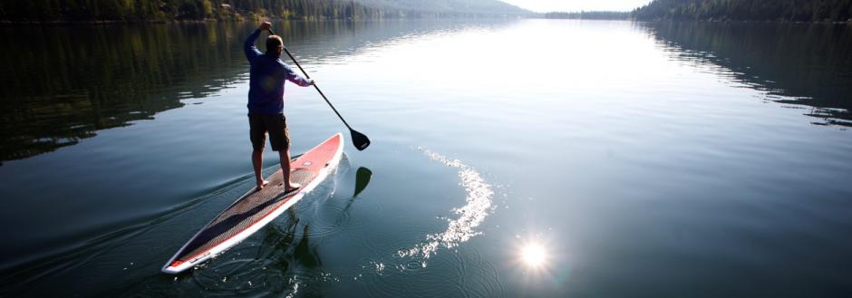 Man paddle boarding on Lake Tahoe