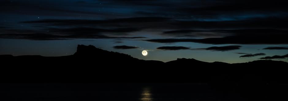 A full moon over the lake