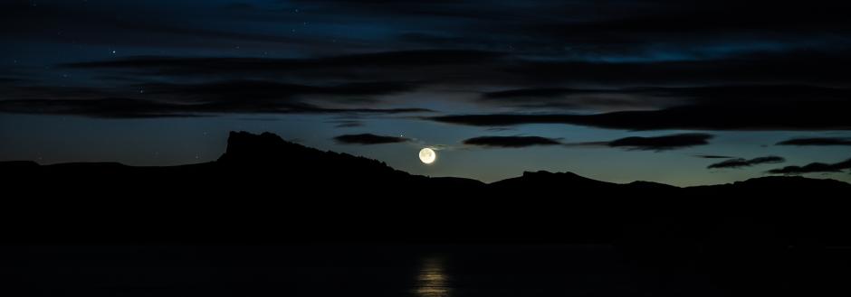 A full moon over the lake