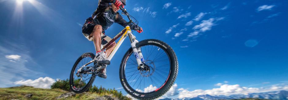 Mountain Biker hitting a jump in Lake Tahoe, CA