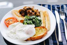 Breakfast food with eggs and toast.