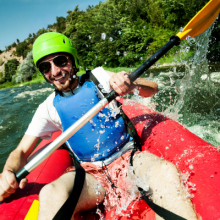 man-having-fun-river-rafting