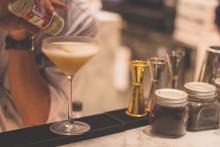 Bartender serving up a margarita