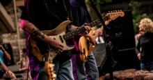 Guitar player on stage at a Blues festival